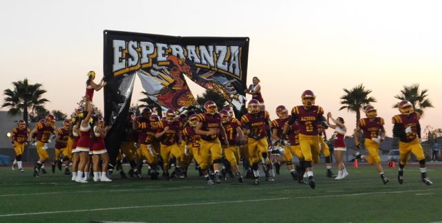 The Aztecs Football team participates in the age-old tradition of Friday Nights Lights. 