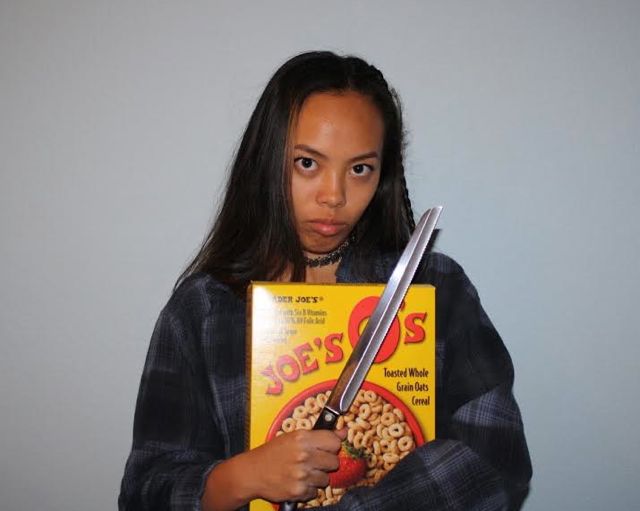 Alyssa Chang, senior, takes a different approach to a cereal killer costume. 