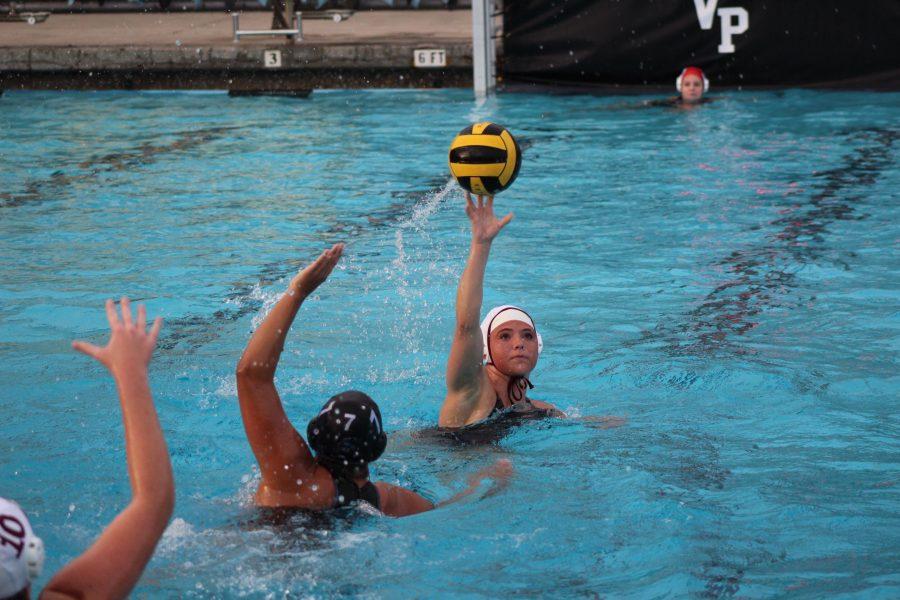 Rachel Westphal catching a ball during the Womens Varsity Polo Game. 