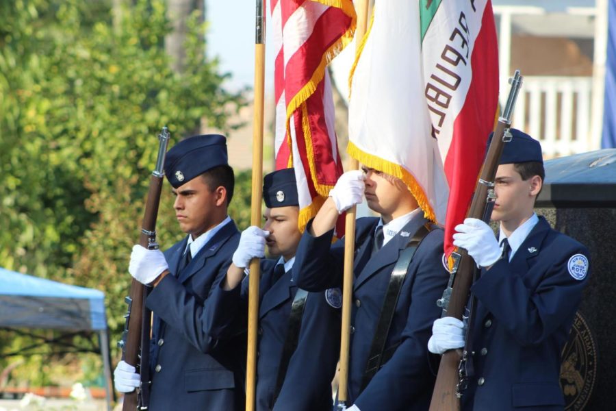 JROTC cadets senior Miles Duran, senior Logan Griffin, junior Juan Marquez Estrella and freshman Ethan Kadera at Veterans Park on Nov. 11. 