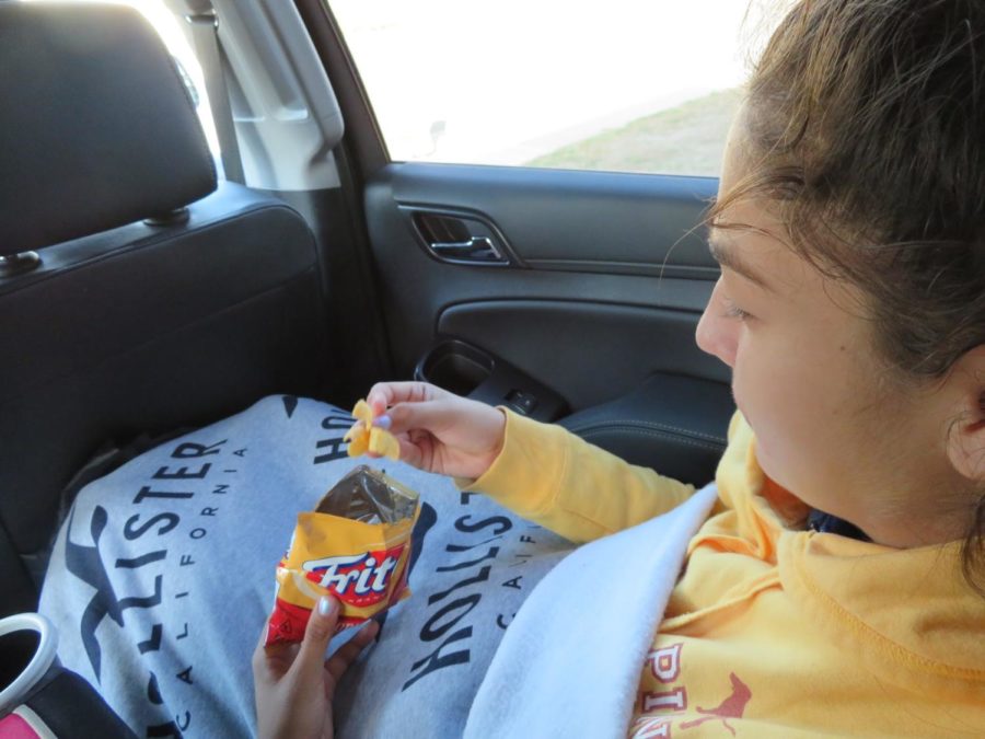 Snacking while during a long car ride is the best thing to do! Maya De La Torre is doing just that for her holiday break.