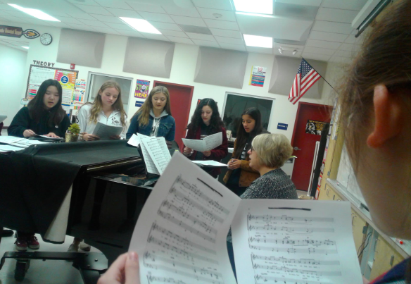 Just another choir day: Freshman Kirsten Doan (right) stands facing Claire Lee, Jacey Beery, Erin Nichols, Evelin Garcia, and Genesis Villegas as they all rehearse on Monday, Jan. 14. 