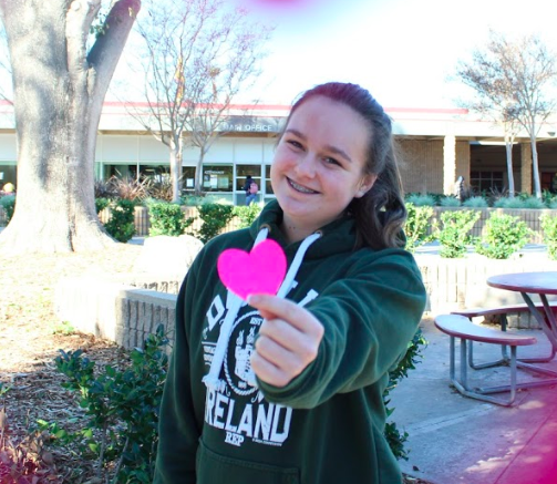 Freshman Meagan Hurley getting ready for some Valentines Day cheer. 