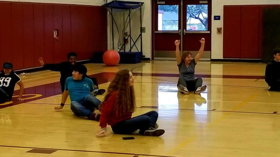 Rachel Williams and Ms.Walters having a great time celebrating a goal during a friendly game of crab soccer with Kaylie Meredith, Xavier Thomas, and Scott Conte. 