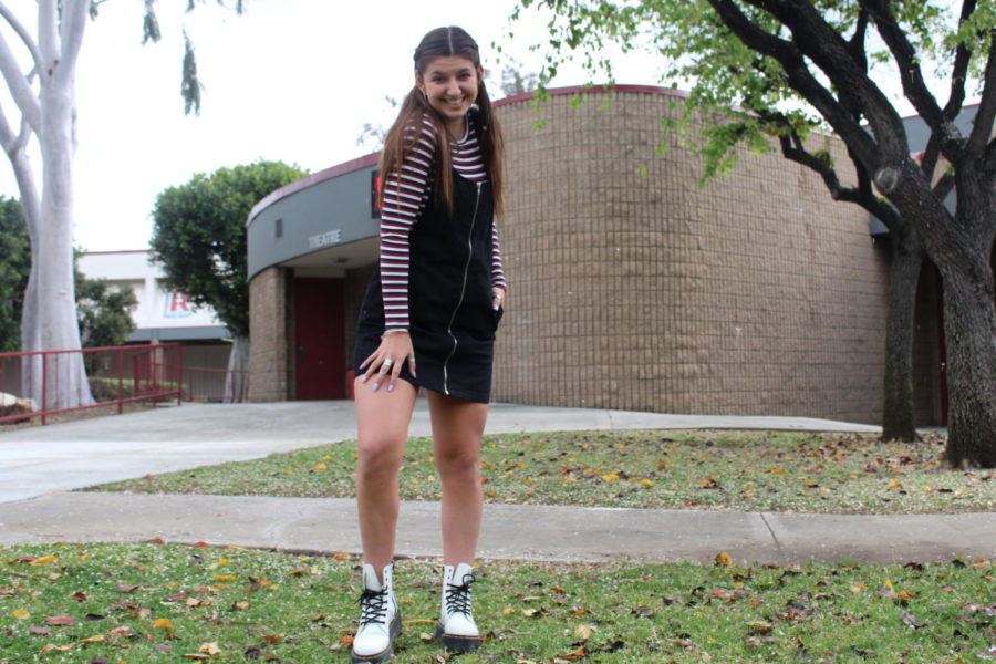 Chloe Masciale bringing back that 90s fashion with her Doc Martens. 