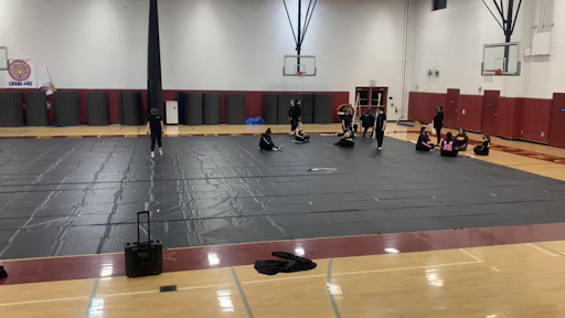 Esperanza’s color guard team at a Wednesday night practice in the practice gym. Picture taken by John Arroyo. 
