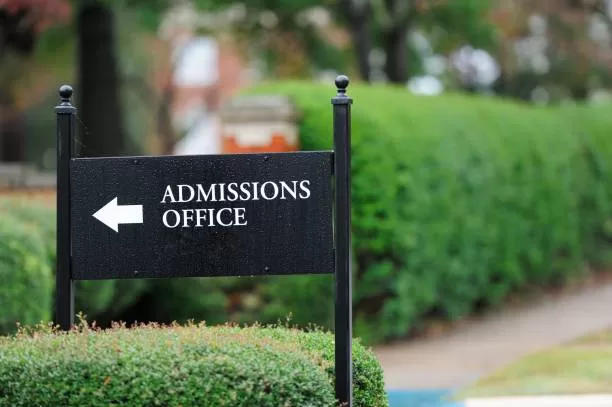 Close+up+of+admissions+office+sign+near+public+university+campus